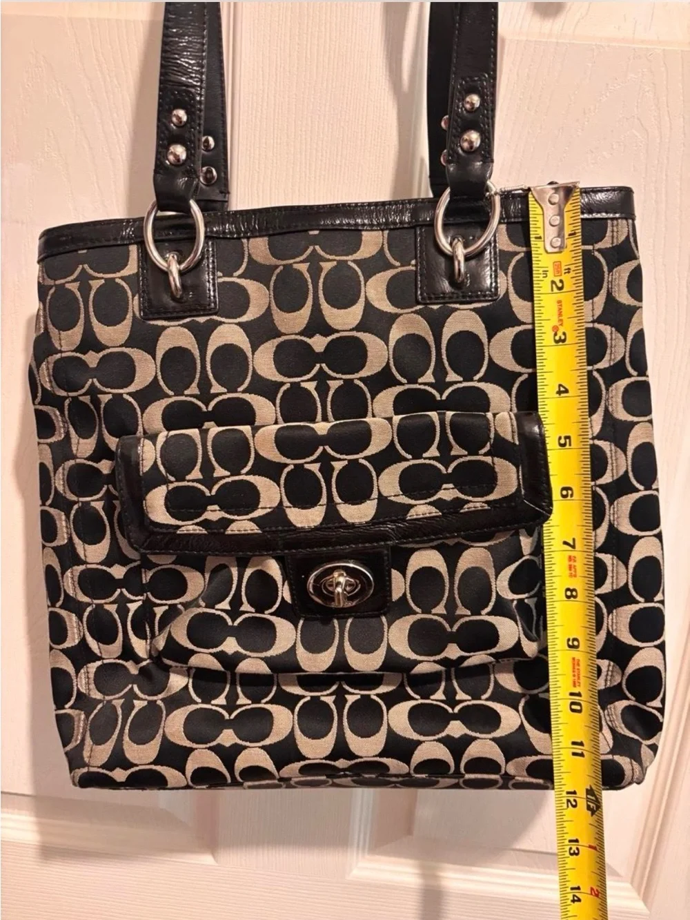 Coach Black and Beige Signature Tote with Front Turn-Lock Pocket